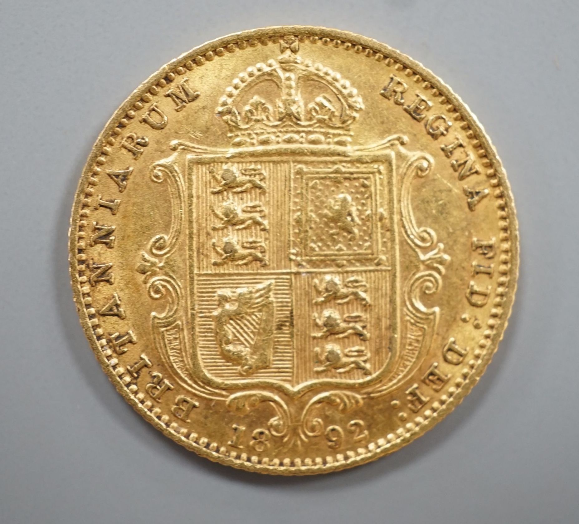 A Victorian gold 1892 half sovereign.